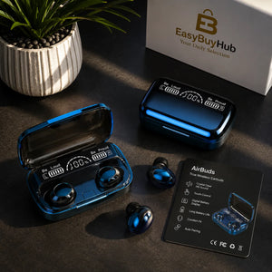 Blue wireless earbuds and their charging case arranged on a dark tabletop, with a product box labeled EasyBuyHub in the background and a black card showing product features. No person or animal is present.