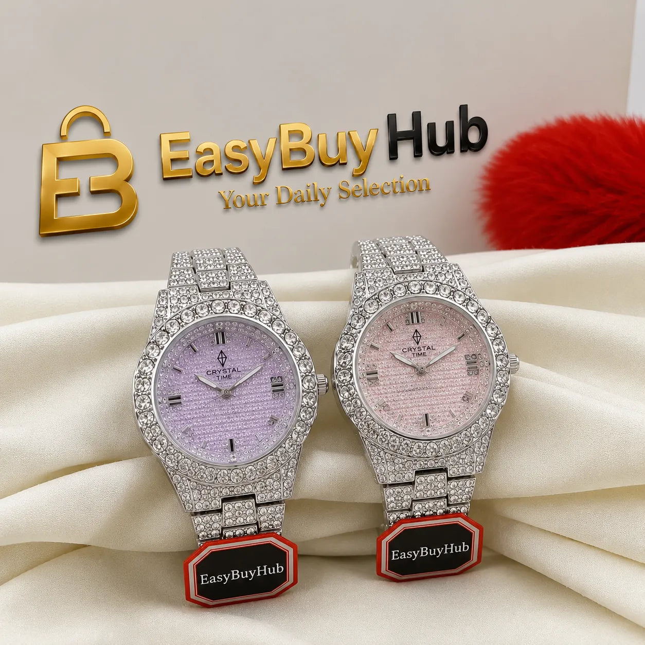 Two luxury crystal-encrusted wristwatches displayed side by side on draped cream fabric. The watch on the left has a lavender-purple dial, and the watch on the right has a pale pink dial.